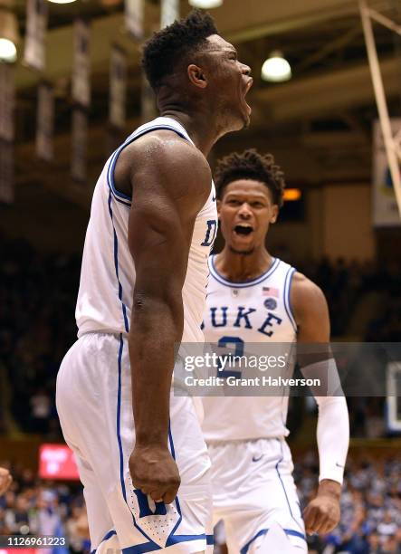 Zion Williamson and Cam Reddish of the Duke Blue Devils react during the second half of their game against the St. John's Red Storm at Cameron Indoor...