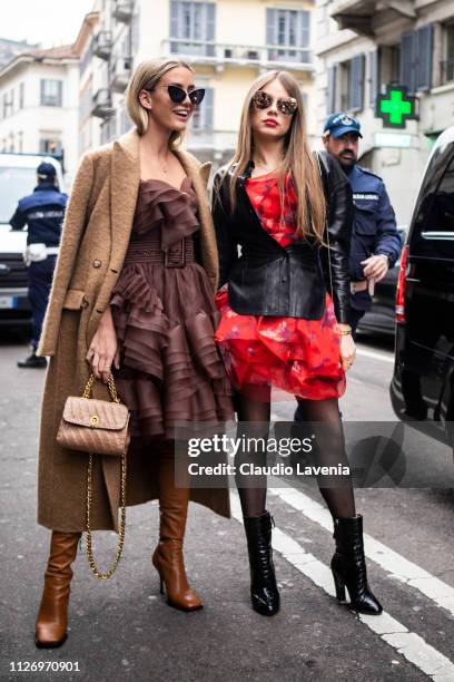 Tatiana Catic and Xenia Tchoumitcheva attend the Ermanno Scervino show at Milan Fashion Week Autumn/Winter 2019/20 on February 23, 2019 in Milan,...
