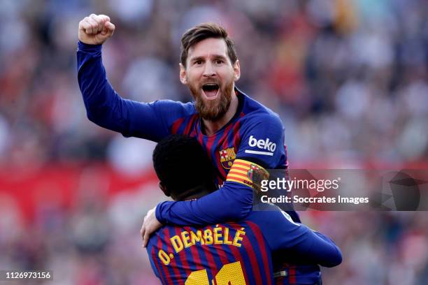 Lionel Messi of FC Barcelona celebrates 2-2 with Ousmane Dembele of FC Barcelona during the La Liga Santander match between Sevilla v FC Barcelona at...