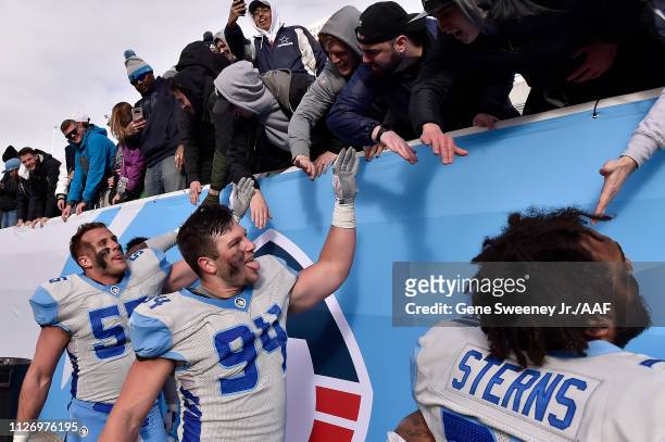 The Salt Lake Stallions celebrate with fans following their 23-15 win over the Arizona Hotshots in their Alliance of American Football game at Rice...