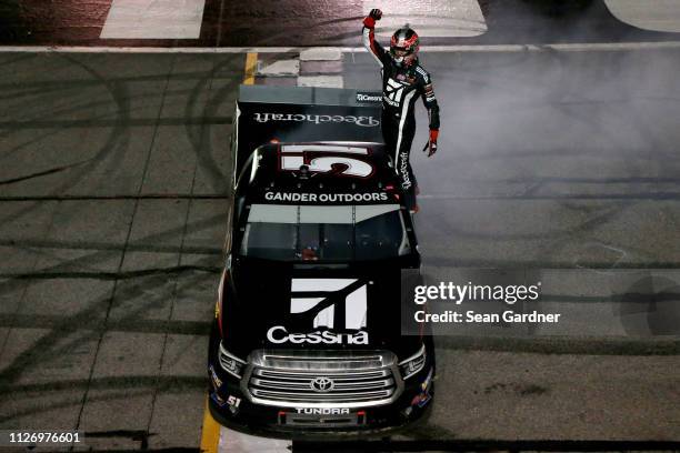 Kyle Busch, driver of the Cessna Toyota, celebrates after winning the NASCAR Gander Outdoors Truck Series Ultimate Tailgating 200 at Atlanta Motor...