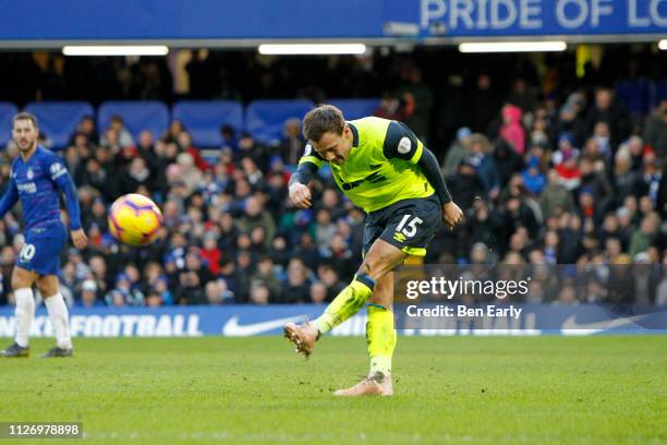 Chris Lowe of Huddersfield Town clears the ball during the Premier League match between Chelsea FC and Huddersfield Town at Stamford Bridge on...