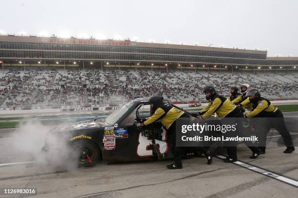 Joe Nemechek, driver of the Chevrolet, pits during the NASCAR Gander Outdoors Truck Series Ultimate Tailgating 200 at Atlanta Motor Speedway on...