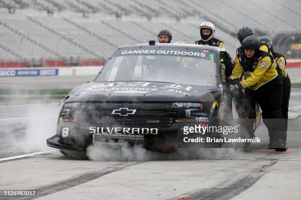 Joe Nemechek, driver of the Chevrolet, pits during the NASCAR Gander Outdoors Truck Series Ultimate Tailgating 200 at Atlanta Motor Speedway on...