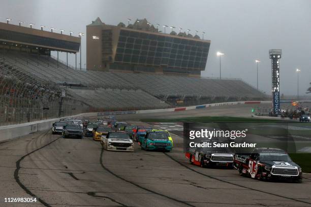 Kyle Busch, driver of the Cessna Toyota, leads during the NASCAR Gander Outdoors Truck Series Ultimate Tailgating 200 at Atlanta Motor Speedway on...