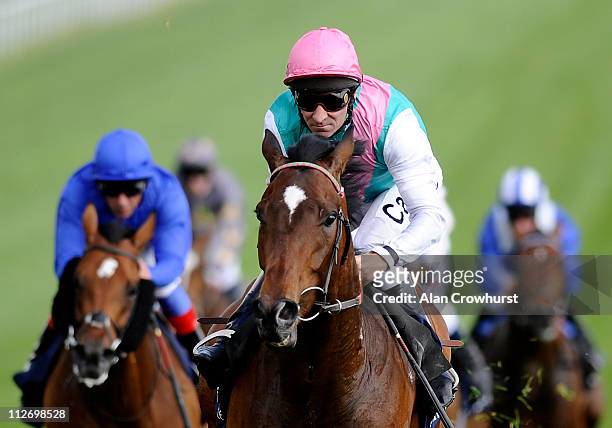 Michael Hills riding Slumber wins the Investec Derby Trial at Epsom racecourse on April 20, 2011 in Epsom, England