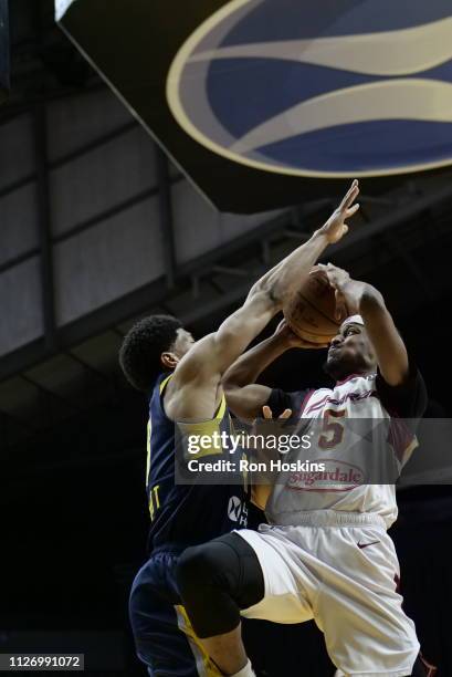 Jordan Barnett of the Fort Wayne Mad Ants battles Muhammad-Ali Abdur-Rahkman of the Canton Charge on February 23, 2019 at Memorial Coliseum in Fort...