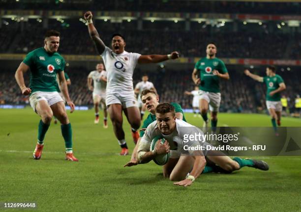 Henry Slade of England dives over for his first try during the Guinness Six Nations match between Ireland and England at Aviva Stadium on February...