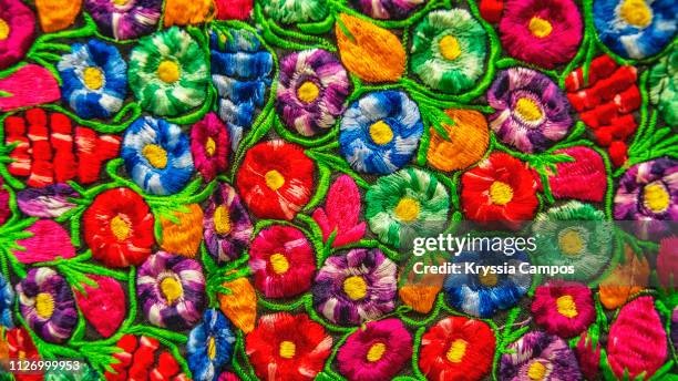 mayan fabrics at in a market at la antigua - guatemala - antigua guatemala stock pictures, royalty-free photos & images