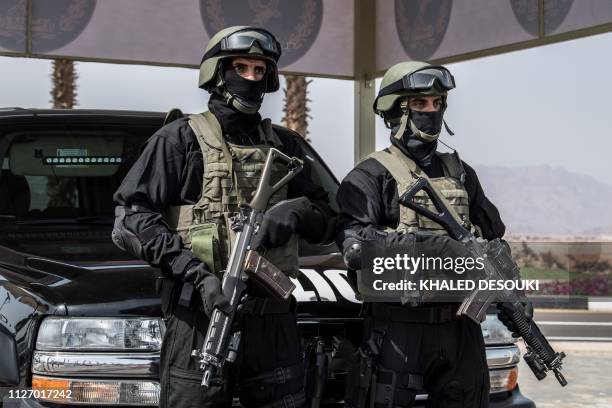 Egyptian Special Forces stand guard outside the International Congress Centre on February 24 ahead of first joint European Union and Arab League...