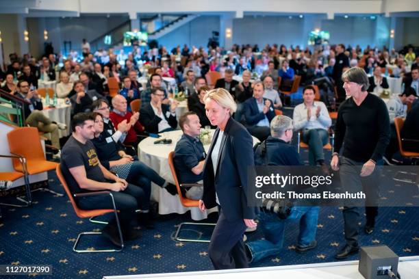 Joachim Loew , head coach of the german national team, and Martina Voss-Tecklenburg, head coach of the german national women team, enter the stage...