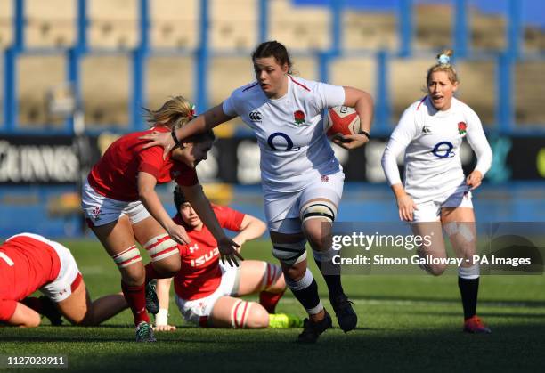 Wales' Alex Callender England's Sarah Beckett during the Guinness Women's Six Nations match at Cardiff Arms Park, Cardiff.