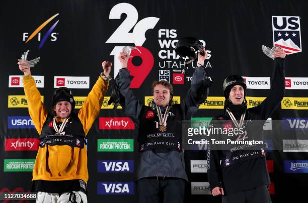 Henrik Harlaut of Sweden in second place, Fabian Boesch of Switzerland in first place and Alex Beaulieu-Marchand of Canada celebrate on the podium in...