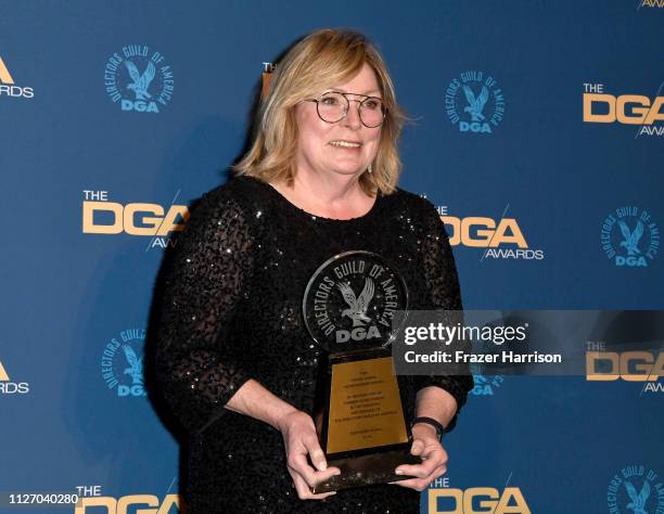 Kathleen McGill poses in the presroom with the Frank Capra Achievement Award during the 71st Annual Directors Guild Of America Awards at The Ray...