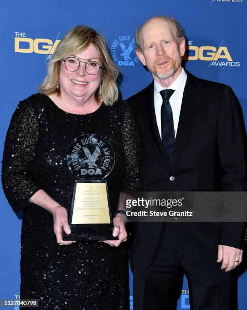 Ron Howard and Kathleen McGill pose in the pressroom with the Frank Capra Achievement Award during the 71st Annual Directors Guild Of America Awards...
