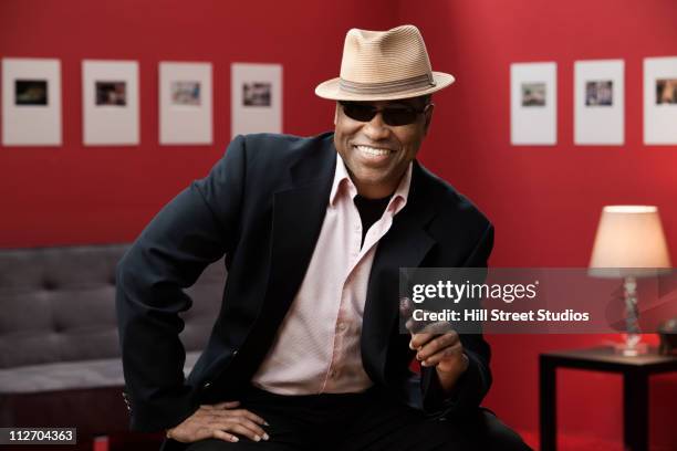 smiling black man in suit, sunglasses and hat - black suit sunglasses stock pictures, royalty-free photos & images