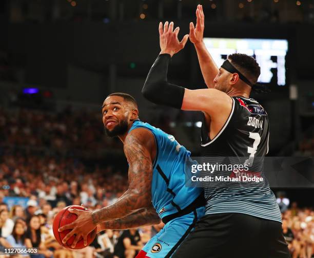 Josh Boone of United guards Shawn Long of the Breakers during the round 16 NBL match between Melbourne United and the New Zealand Breakers at Hisense...