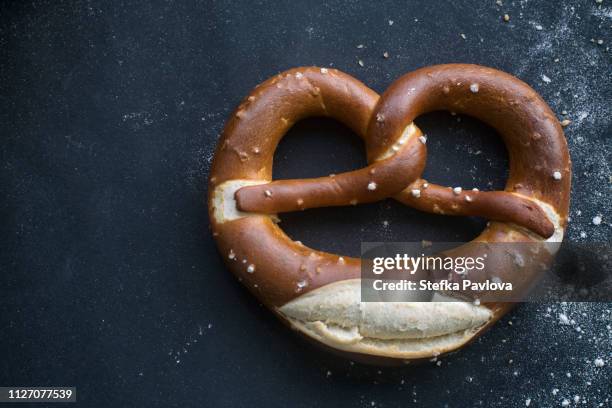 close-up of freshly backed pretzel - bavaria traditional stock pictures, royalty-free photos & images