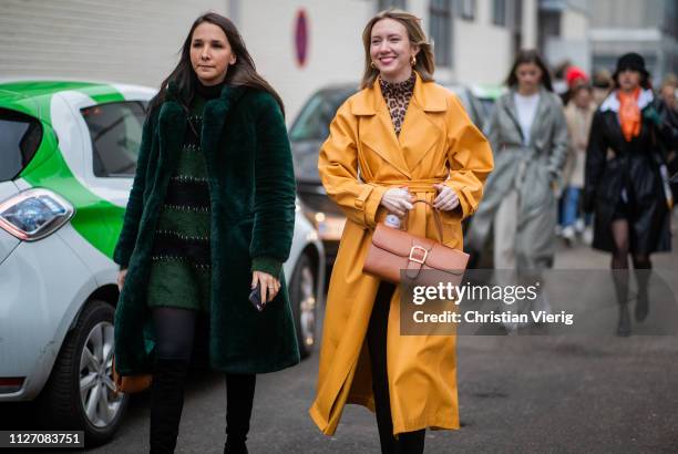 Lisa Aiken is seen wearing yellow coat, two tone boots, brown bag outside Baum und Pferdgarten during the Copenhagen Fashion Week Autumn/Winter 2019...