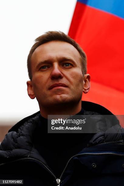 Russian opposition leader Alexei Navalny takes part in a march at Strastnoy Boulevard in memory of Russian politician and opposition leader Boris...