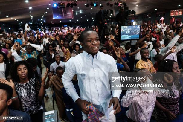 Worshipers of the Nigerian Pentecostal church Salvation Ministries attend the 5th Sunday service at their church headquarters in Port Harcourt,...