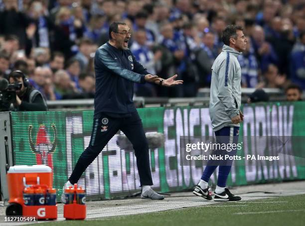 Chelsea manager Maurizio Sarri reacts as his goalkeeper Kepa Arrizabalaga refuses to leave the pitch after his proposed substitution during the...