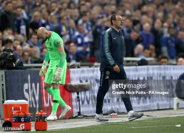 Chelsea manager Maurizio Sarri looks on next to substitute goalkeeper Willy Caballero as his first-choice goalkeeper Kepa Arrizabalaga refuses to...