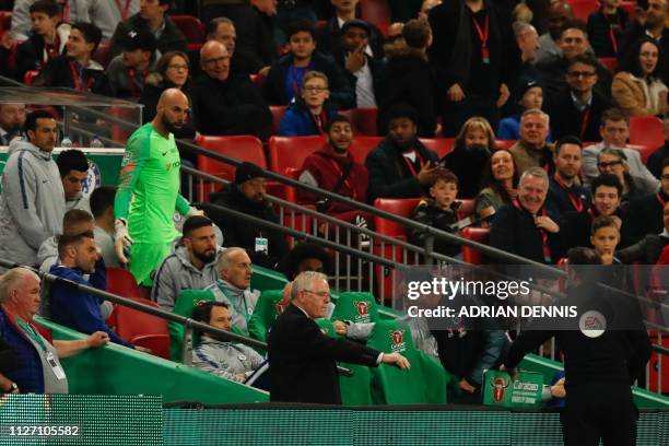 Chelsea's Italian head coach Maurizio Sarri reacts after Chelsea's Spanish goalkeeper Kepa Arrizabalaga remains on the pitch after an attempt to...