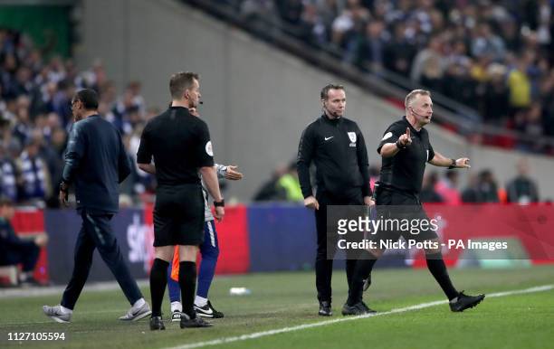 Chelsea manager Maurizio Sarri walks away after speaking with referee Jonathan Moss after his first-choice goalkeeper Kepa Arrizabalaga refuses to...