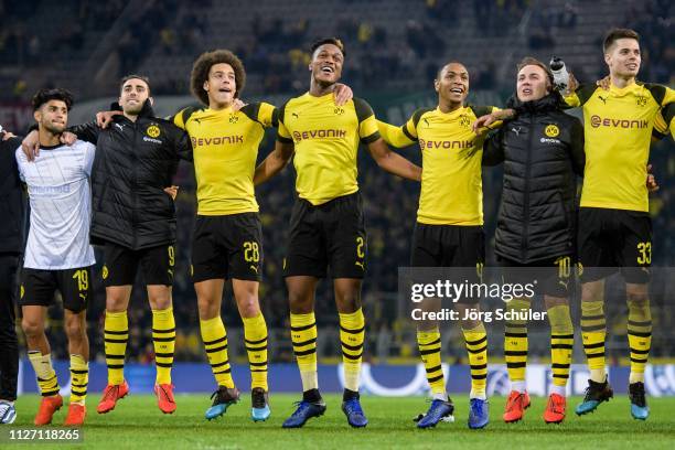 Mahmoud Dahoud, Paco Alcacer, Axel Witsel, Dan-Axel Zagadou, Abdou Diallo, Mario Goetze and Julian Weigl celebrating their win after the Bundesliga...