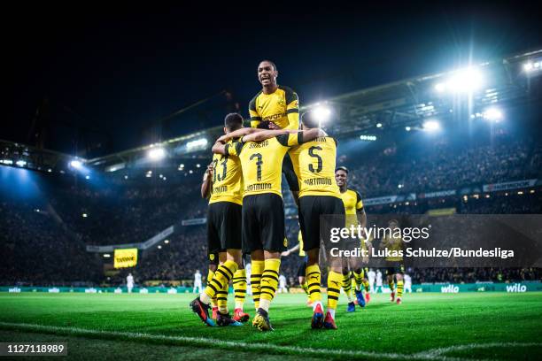 Abdou Diallo of Dortmund celebrates with Julian Weigl , Jadon Sancho and Aschraf Hakimi their teams second goal during the Bundesliga match between...