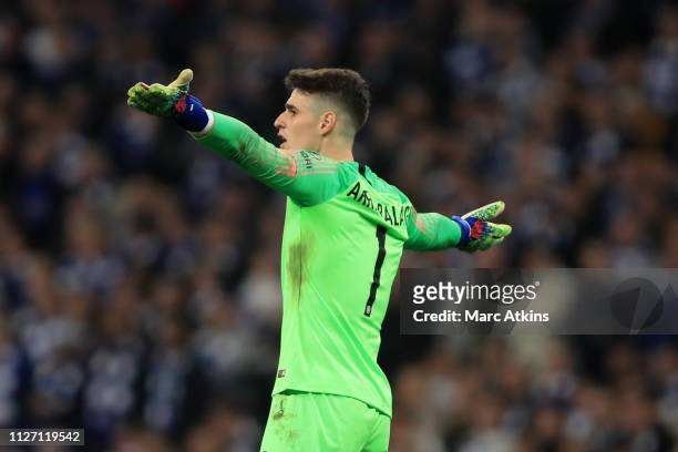 Kepa Arrizabalaga of Chelsea reacts as Maurizio Sarri tries to substitute him during the Carabao Cup Final between Chelsea and Manchester City at...