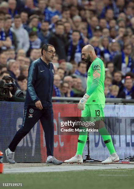 Maurizio Sarri manager of Chelsea walks past Willy Caballero of Chelsea as he tries to use him to replace Kepa Arrizabalaga during the Carabao Cup...