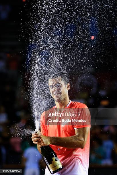 Laslo Djere of Serbia celebrates the victory after defeating Felix Auger-Aliassime of Canada at the singles final of the ATP Rio Open 2019 at Jockey...
