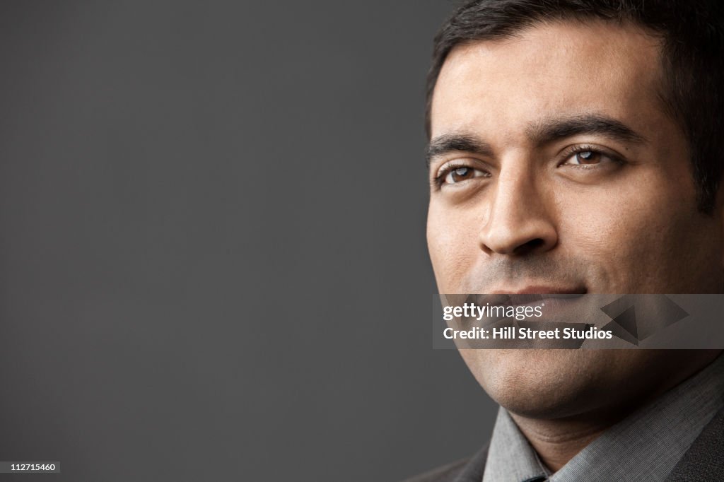 Smiling Hispanic businessman