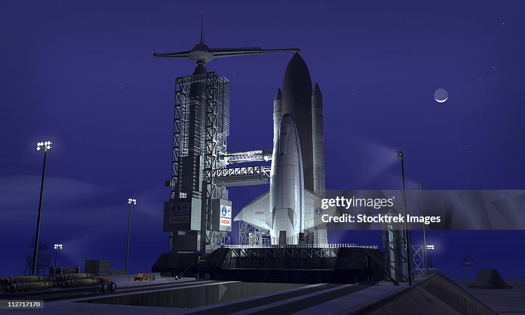 A futuristic space shuttle awaits launch.