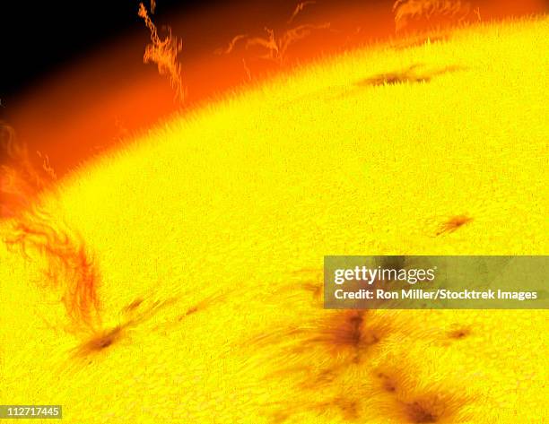 the turbulent surface of our sun, showing prominences, sunspots and other features. - coronal mass ejection stock illustrations