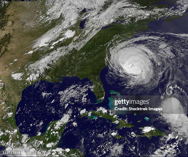 september 2, 2010 - hurricane earl showing a tightly wound spiral of clouds with a clear eye.  it grazes cape hatteras, north carolina. - hurricane eye stock pictures, royalty-free photos & images