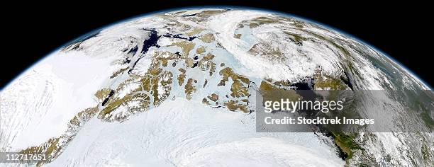 partial view of earth showing northern canada and northern greenland. - nordhalbkugel stock-fotos und bilder