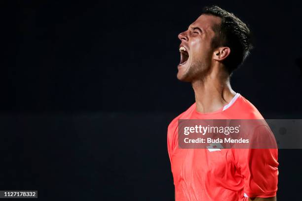 Laslo Djere of Serbia celebrates the victory after defeating Felix Auger-Aliassime of Canada at the singles final of the ATP Rio Open 2019 at Jockey...