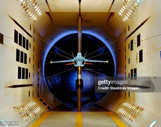 an a/a-18 e/f model tested in a wind tunnel. - aerodynamic stock pictures, royalty-free photos & images