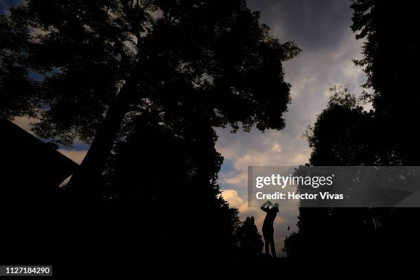 Tommy Fleetwood of England plays his shot on the 11th hole during the final round of World Golf Championships-Mexico Championship at Club de Golf...