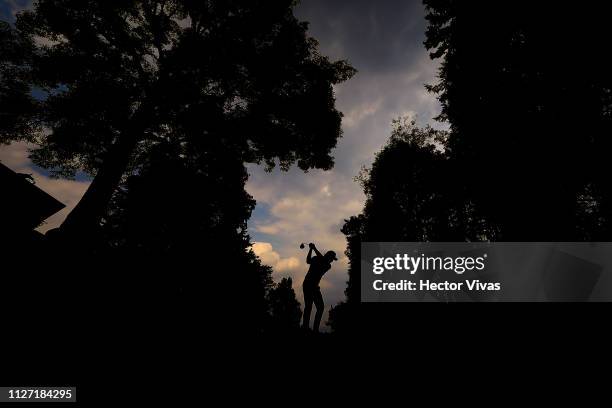 Tommy Fleetwood of England plays his shot on the 11th hole during the final round of World Golf Championships-Mexico Championship at Club de Golf...