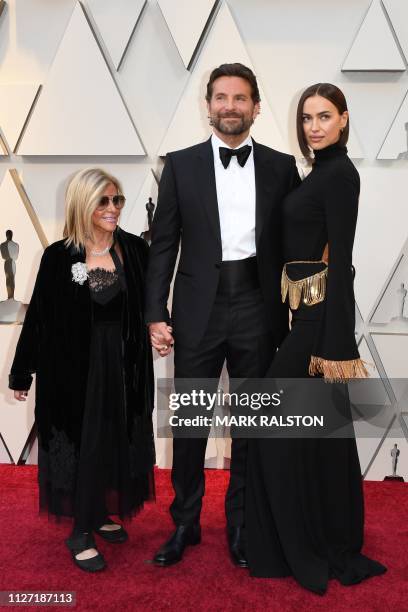 Best Actor nominee for "A Star is Born" Bradley Cooper , his wife Russian model Irina Shayk and his mom Gloria Campano arrives for the 91st Annual...