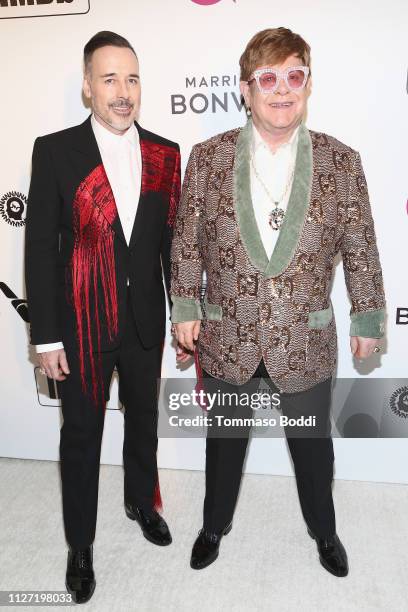 David Furnish and Elton John attend IMDb LIVE At The Elton John AIDS Foundation Academy Awards® Viewing Party on February 24, 2019 in Los Angeles,...