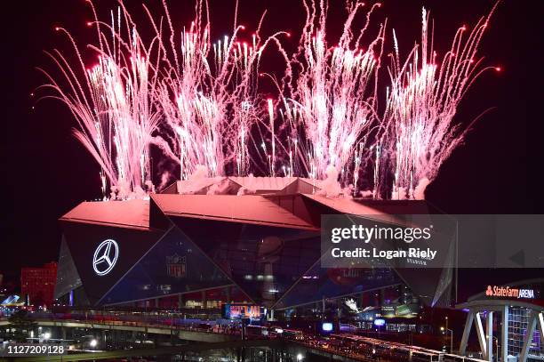Fireworks shoot in the air above Mercedes-Benz stadium during halftime of Super Bowl LIII between the New England Patriots and Los Angeles Rams on...