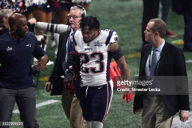 Patrick Chung of the New England Patriots walks off the field after sustaining an injury in the third quarter against the Los Angeles Rams during...