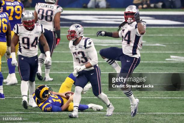 Dont'a Hightower of the New England Patriots celebrates a third quarter sack against Jared Goff of the Los Angeles Rams during Super Bowl LIII at...