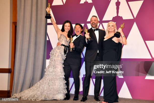 The producers of "Free Solo" pose with the award for Best Documentary Feature in the press room during at Hollywood and Highland on February 24, 2019...