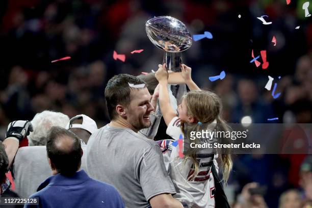 Tom Brady of the New England Patriots and Vivian Lake Brady celebrate with the Vince Lombardi trophy after the teams 13-3 win over Los Angeles Rams...
